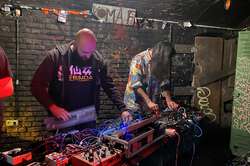 Greg and his friend playing in Køpi