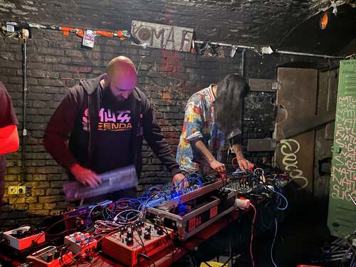 Greg and his friend playing in Køpi